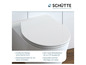Un abattant de toilette blanc avec fermeture douce et un design moderne.