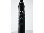 Brosse à dents électrique noire avec bouton d'alimentation et mode massage éclairé.