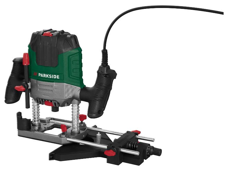 Défonceuse électrique verte et noire avec câble, sur un support.