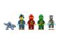 Quatre figurines LEGO Ninjago et un dragon de glace.