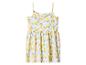 Robe blanche à fines bretelles pour enfant avec motif citrons et feuilles.