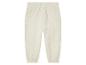 Pantalon bébé en gaze de coton beige clair.