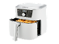 Friteuse à air chaud blanche avec des frites, affichant 200 degrés Celsius.
