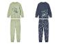 Deux pyjamas à imprimé dinosaure pour enfants.