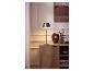 Lampe de table LED sans fil LIVARNO home sur un buffet en bois.