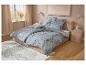 Drap-housse en jersey LIVARNO home sur un lit douillet dans une chambre moderne.