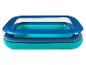 Piscine gonflable rectangulaire avec des couches bleues et transparentes.