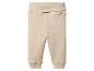 Pantalon bébé beige avec taille et poignets côtelés.
