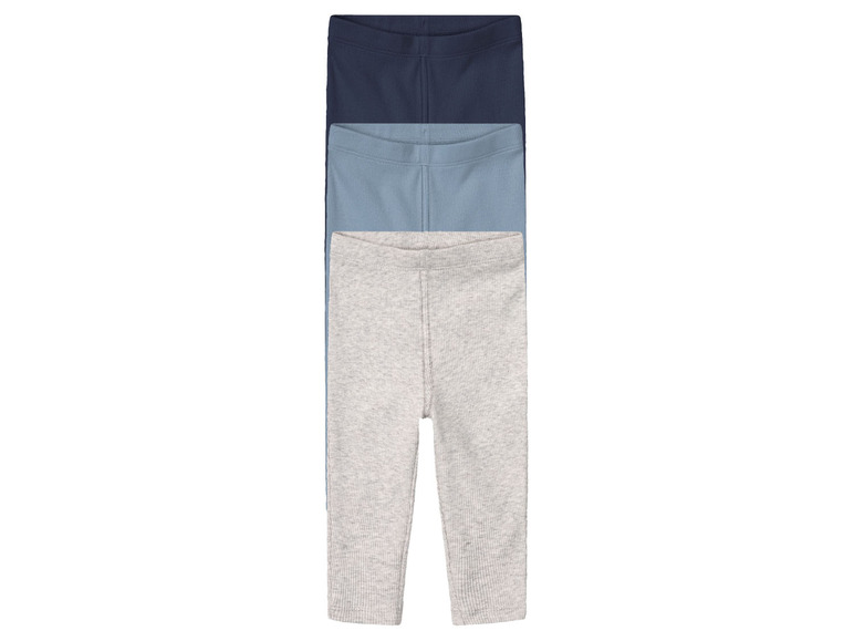 Trois paires de leggings côtelés en gris, bleu et bleu marine.