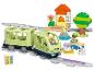 Ensemble de train Lego Duplo avec train, gare, figurines et animaux sur fond blanc.