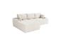 Canapé d'angle modulaire beige avec coussins, revêtu de tissu côtelé.