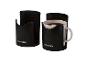 Deux porte-tasses noirs PARKSIDE, l'un avec une tasse de café