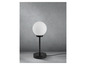 Lampe de table noire avec abat-jour rond blanc.