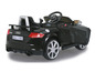Voiture pour enfant Audi TT RS noire avec la porte ouverte.