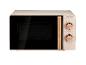 Micro-ondes SilverCrest beige rétro avec commandes rotatives.