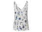 Un débardeur blanc avec un motif floral bleu.