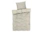 Housse de couette beige avec un motif floral blanc.