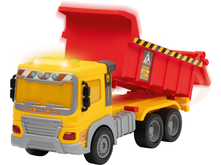 Camion benne jouet jaune et rouge avec lumières allumées et panneaux d'avertissement.
