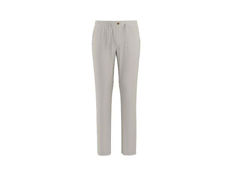 Pantalon de jogging beige clair avec cordon de serrage à la taille.