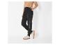 Pantalon de jogging noir avec logo U.S. Grand Polo et baskets blanches.