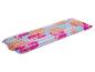 Matelas pneumatique Crivit à fleurs tropicales pour la piscine.