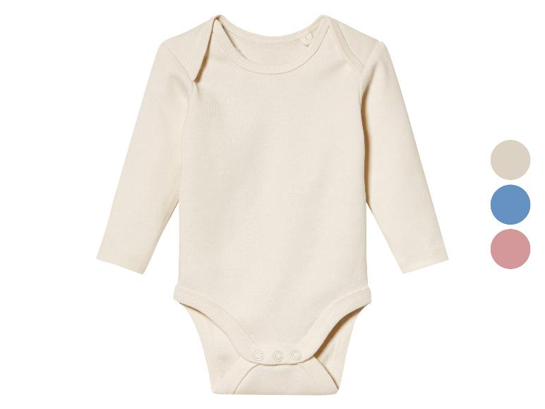 Body bébé blanc à manches longues et boutons pression.