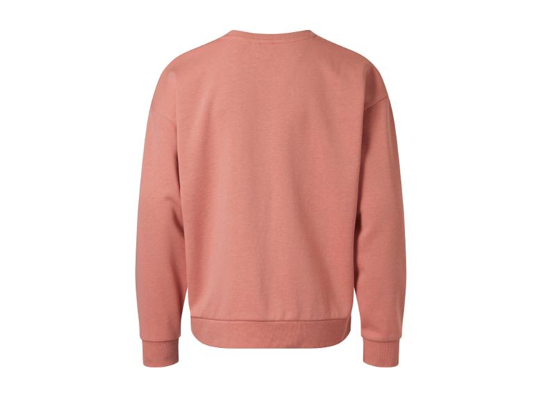 Sweat-shirt rose à manches longues.