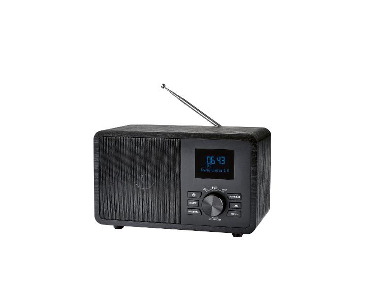 Radio rétro noire avec écran LCD.