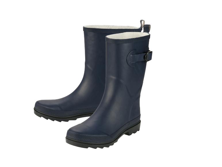 Une paire de bottes de pluie bleu foncé avec doublure blanche et boucle latérale.