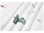 Gros plan sur un tissu doux pour enfants avec des motifs d'hiver de rennes et de sapins