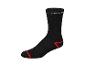 Chaussettes noires Parkside avec des détails rouges.