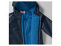 Une veste imperméable bleu marine avec une doublure en polaire bleue, avec le logo Nickelodeon.
