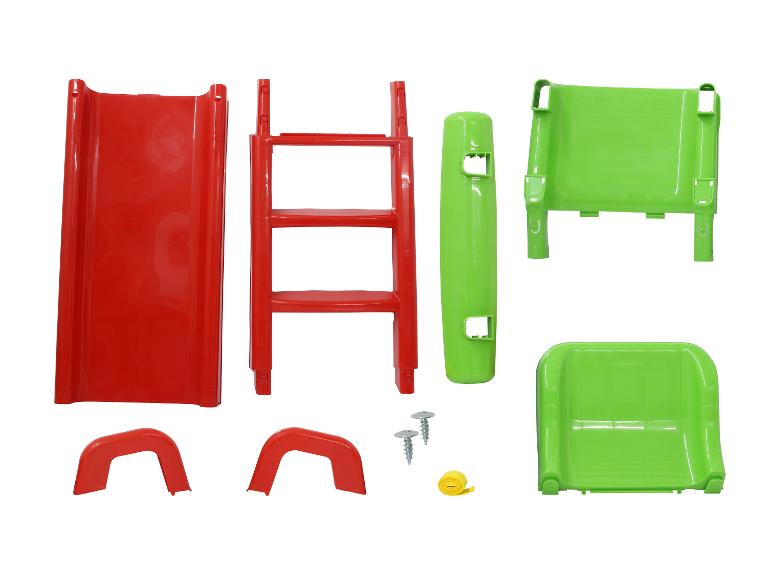 Pièces d'un toboggan pour enfants en plastique rouge et vert.