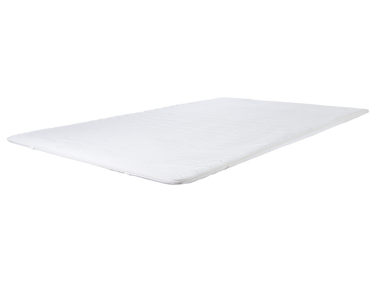 Un matelas blanc avec une fermeture éclair