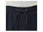 Pantalon de survêtement bleu foncé avec cordon de serrage à la taille.