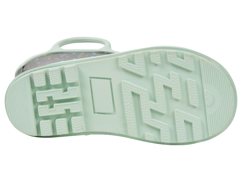 Semelle d'une chaussure d'enfant de couleur vert menthe.