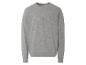 Un sweat-shirt gris à manches longues avec 'UrbanDrift' imprimé dessus.