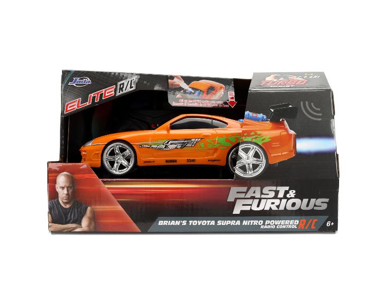 Une voiture télécommandée Jada Elite R/C Fast & Furious Brian's Toyota Supra Nitro Powered dans son emballage.