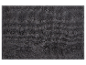 Tapis de bain gris foncé, texture douce.