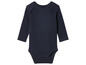 Un body bébé à manches longues de couleur bleu marine.