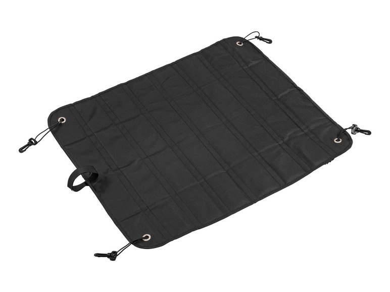 Un tapis de rangement pliable noir avec des boucles.