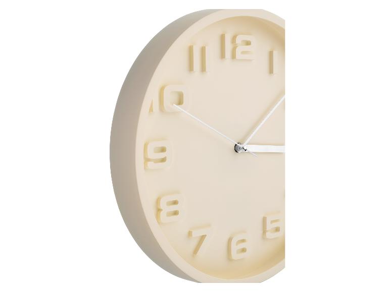 Horloge murale beige crème design minimaliste.
