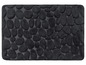 Un tapis de bain noir avec un relief de pierres rondes.
