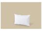Oreiller blanc matelassé sur fond beige