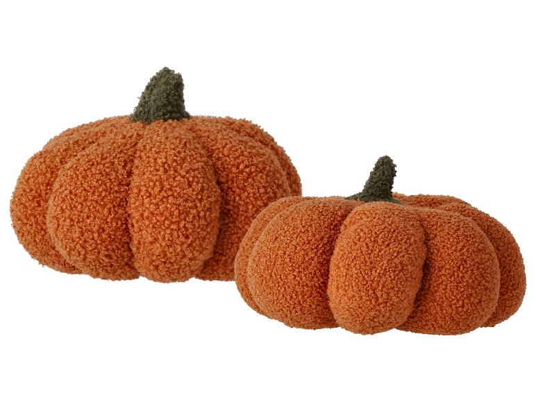 Deux citrouilles en peluche orange.
