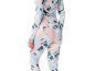 Ensemble de sport femme avec motif abstrait en bleu clair, rose et bleu foncé.