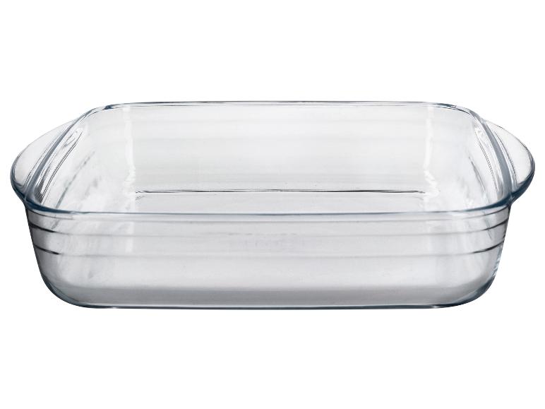 Plat de cuisson en verre transparent avec poignées.