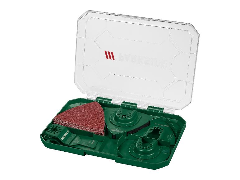 Ensemble d'accessoires Parkside pour outil multifonction dans une boîte en plastique verte.