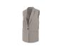 Blazer long sans manches de couleur beige clair avec un seul bouton noir.