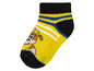 Des chaussettes jaunes avec un motif Paw Patrol.